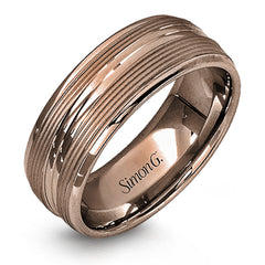 A contemporary ribbed design in lustrous white gold is outlined with two exquisite yellow gold bands in this striking men's wedding band.