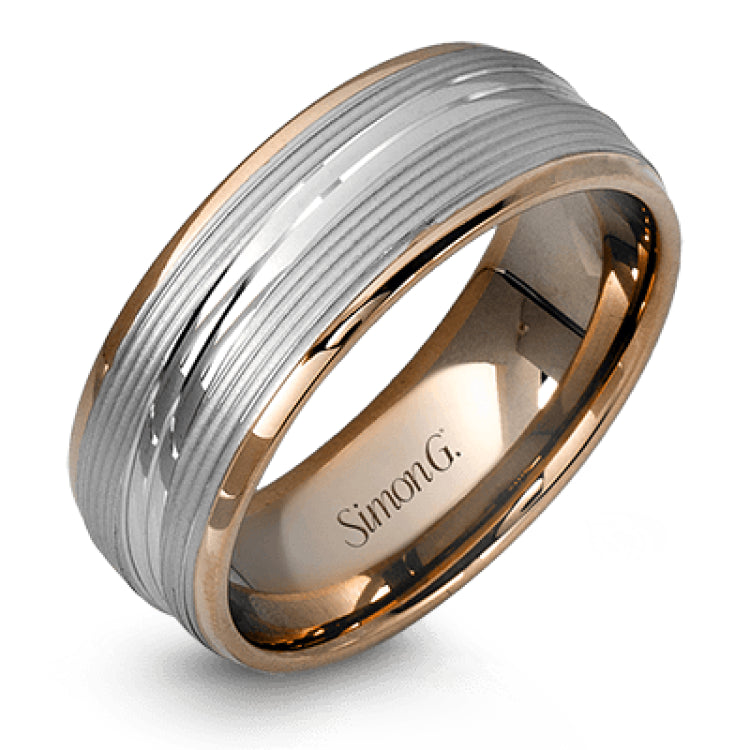 A contemporary ribbed design in lustrous white gold is outlined with two exquisite yellow gold bands in this striking men's wedding band.