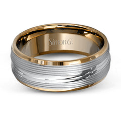 A contemporary ribbed design in lustrous white gold is outlined with two exquisite yellow gold bands in this striking men's wedding band.