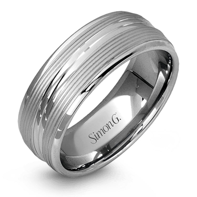 A contemporary ribbed design in lustrous white gold is outlined with two exquisite yellow gold bands in this striking men's wedding band.