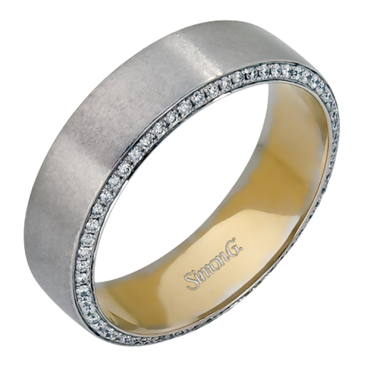 The classic design of this two-tone band features a hint of modernism with a yellow gold interior and white gold exterior accentuated by .50 ctw round cut white diamonds.