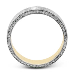 The classic design of this two-tone band features a hint of modernism with a yellow gold interior and white gold exterior accentuated by .50 ctw round cut white diamonds.