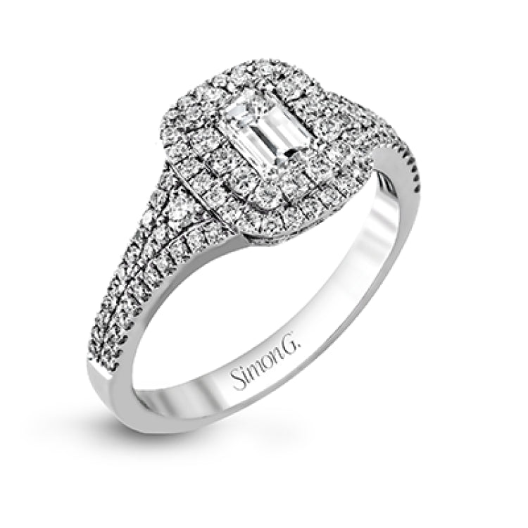 This show-stopping white gold ring features intricately detailed halo and sides containing a total of .61 ctw in round white diamonds.