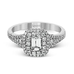 This show-stopping white gold ring features intricately detailed halo and sides containing a total of .61 ctw in round white diamonds.