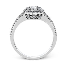 This show-stopping white gold ring features intricately detailed halo and sides containing a total of .61 ctw in round white diamonds.