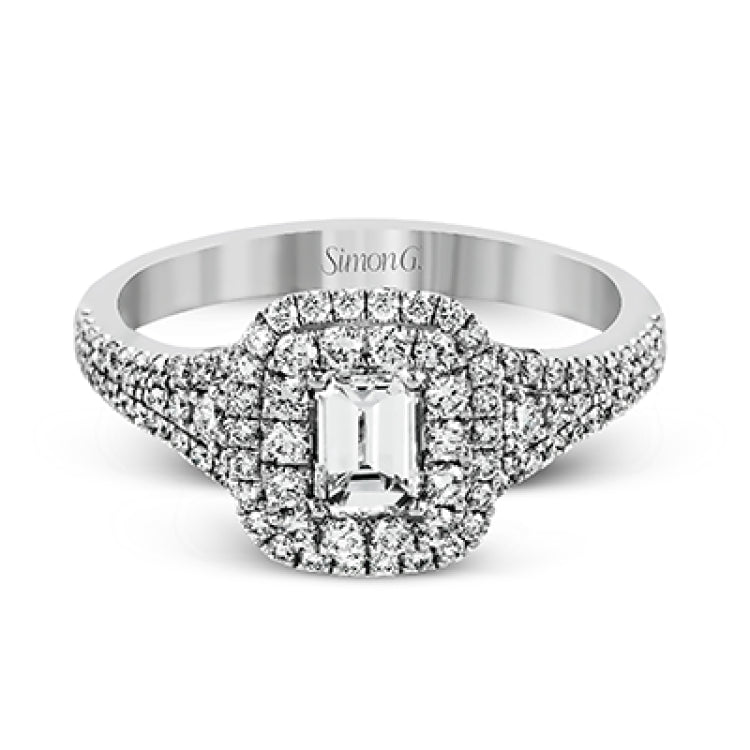 This show-stopping white gold ring features intricately detailed halo and sides containing a total of .61 ctw in round white diamonds.