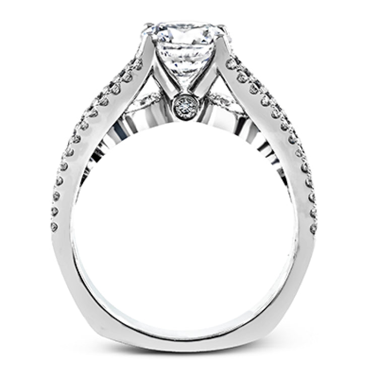 The lovely vintage style of this white gold engagement ring is further enhanced by .91 ctw of shimmering round cut diamonds.