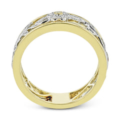 Reflecting a charming vintage floral design, this white and yellow gold band is accentuated by .09 ctw round cut white diamonds and .01 ctw round cut yellow diamonds.