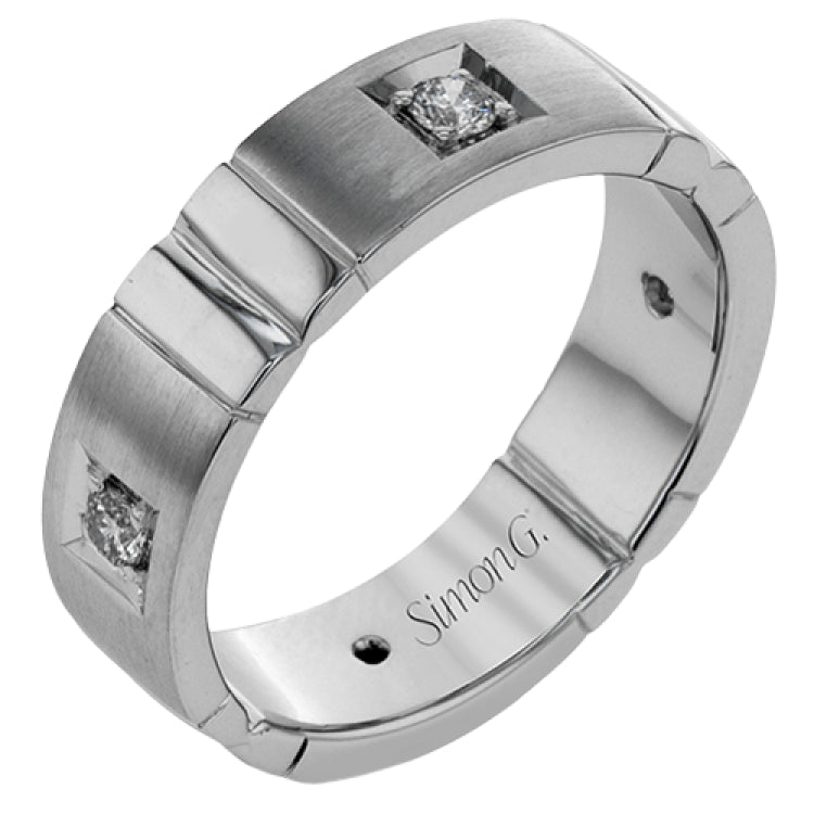Featuring an impressive contemporary design, this white gold band is inset with .32 ctw of round cut white diamond and rose gold accents.