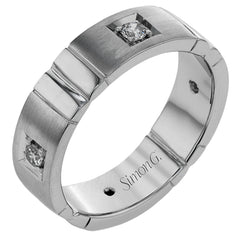 Featuring an impressive contemporary design, this white gold band is inset with .32 ctw of round cut white diamond and rose gold accents.