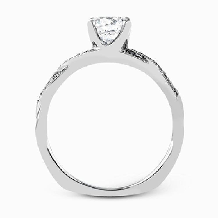 Featuring a modern design, this elegant white gold engagement ring and wedding band set are accentuated by .22 ctw of shimmering round cut white diamonds.