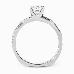 Featuring a modern design, this elegant white gold engagement ring and wedding band set are accentuated by .22 ctw of shimmering round cut white diamonds.