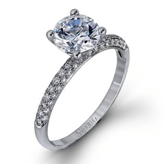 This impressive contemporary white gold engagement ring and wedding band set are emphasized by 1.00 ctw of dazzling round cut white diamonds.