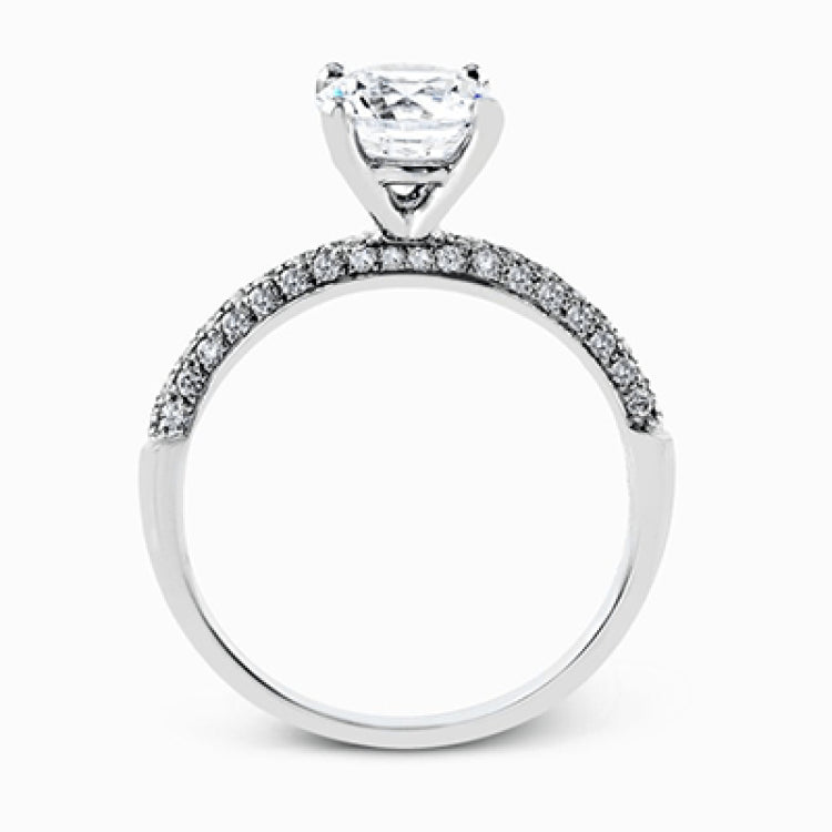 This impressive contemporary white gold engagement ring and wedding band set are emphasized by 1.00 ctw of dazzling round cut white diamonds.