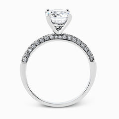 This impressive contemporary white gold engagement ring and wedding band set are emphasized by 1.00 ctw of dazzling round cut white diamonds.