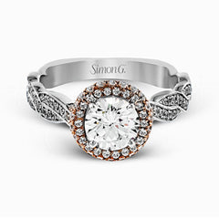 The distinctive twisted design on the band of this contemporary white and rose gold engagement ring is complemented by a gorgeous geometric setting featuring .25 ctw of round cut white diamonds.