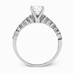 Featuring a charming classic design, this white gold engagement set is accented by .48 ctw of glistening round cut white diamonds.