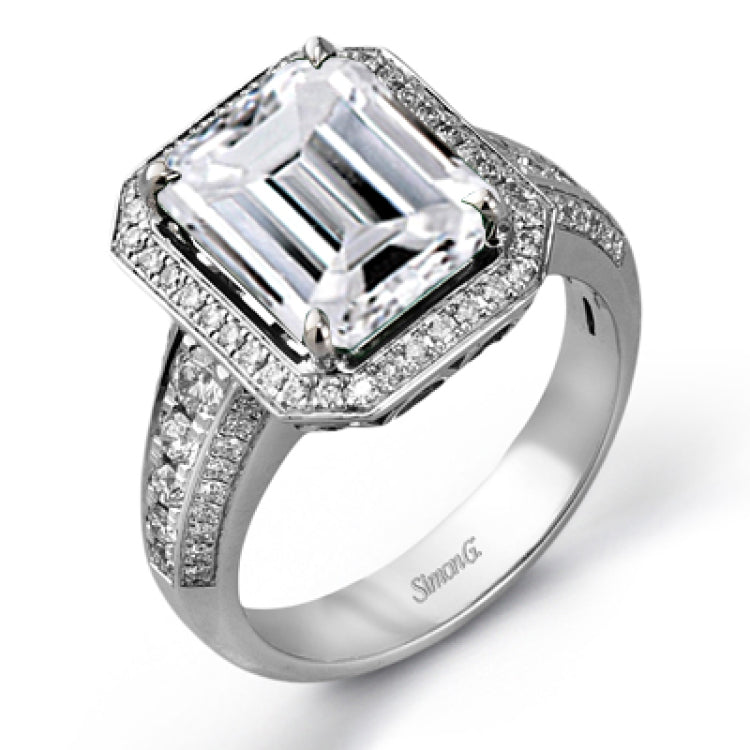 A classic, this 18K white gold ring showcases a 3.52ct emerald and .61cttw white diamonds.