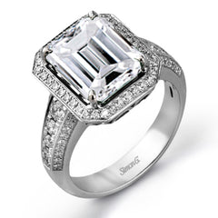 A classic, this 18K white gold ring showcases a 3.52ct emerald and .61cttw white diamonds.
