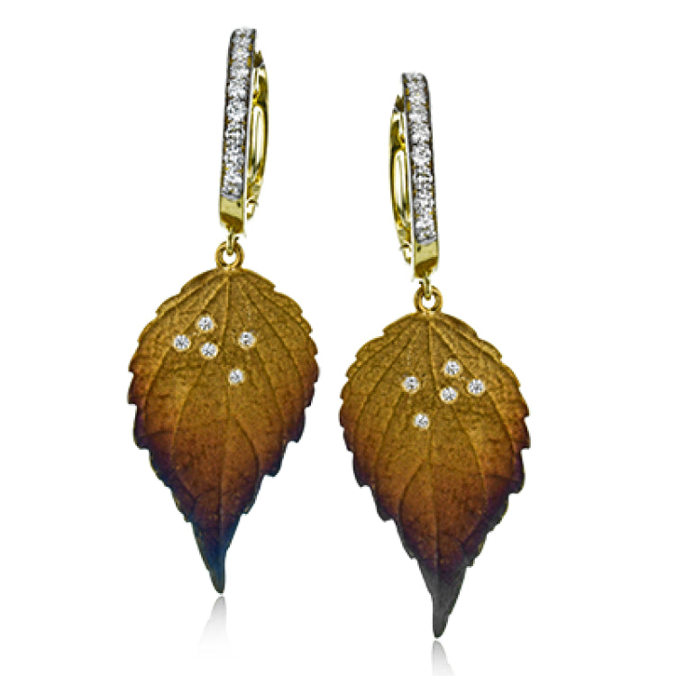Gorgeous autumnal colors light up these earrings, which contain .19 ctw of diamonds.