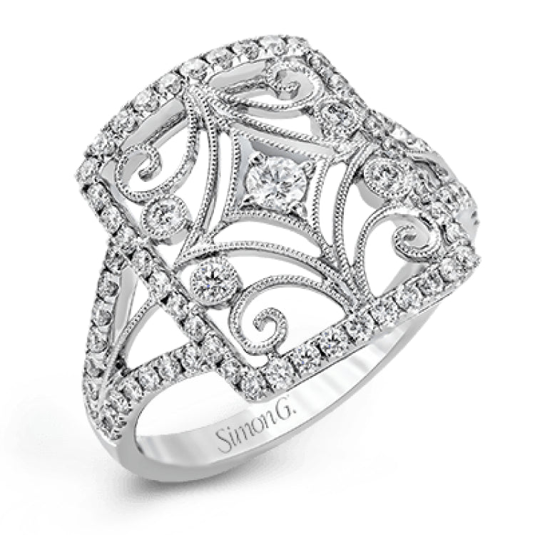 The intricate design of this vintage style white gold ring is enhanced by .64 ctw of glistening round cut white diamonds.