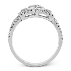 The intricate design of this vintage style white gold ring is enhanced by .64 ctw of glistening round cut white diamonds.