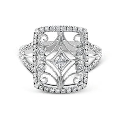 The intricate design of this vintage style white gold ring is enhanced by .64 ctw of glistening round cut white diamonds.