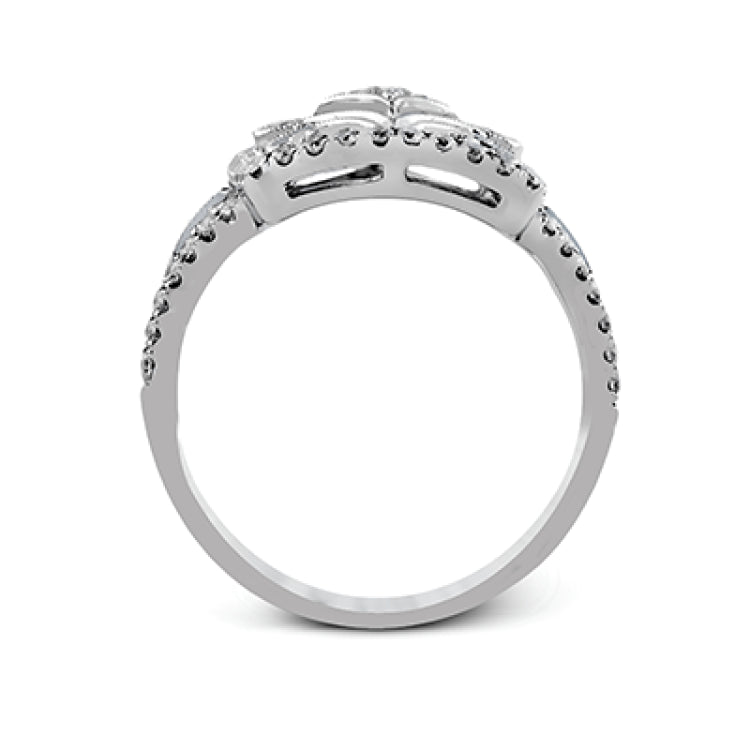 The intricate design of this vintage style white gold ring is enhanced by .64 ctw of glistening round cut white diamonds.