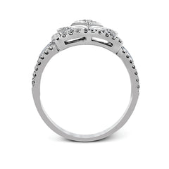 The intricate design of this vintage style white gold ring is enhanced by .64 ctw of glistening round cut white diamonds.