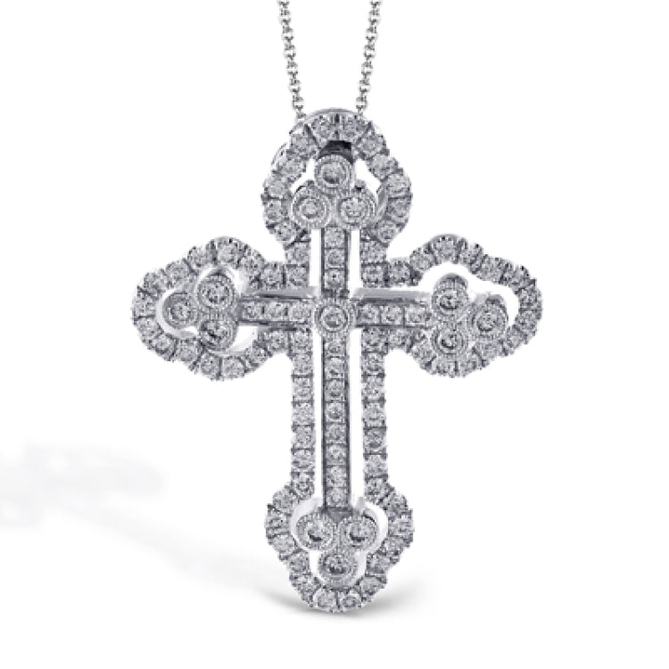 Featuring a classic motif, this intricate white gold cross pendant is set with .44 ctw round white diamonds.