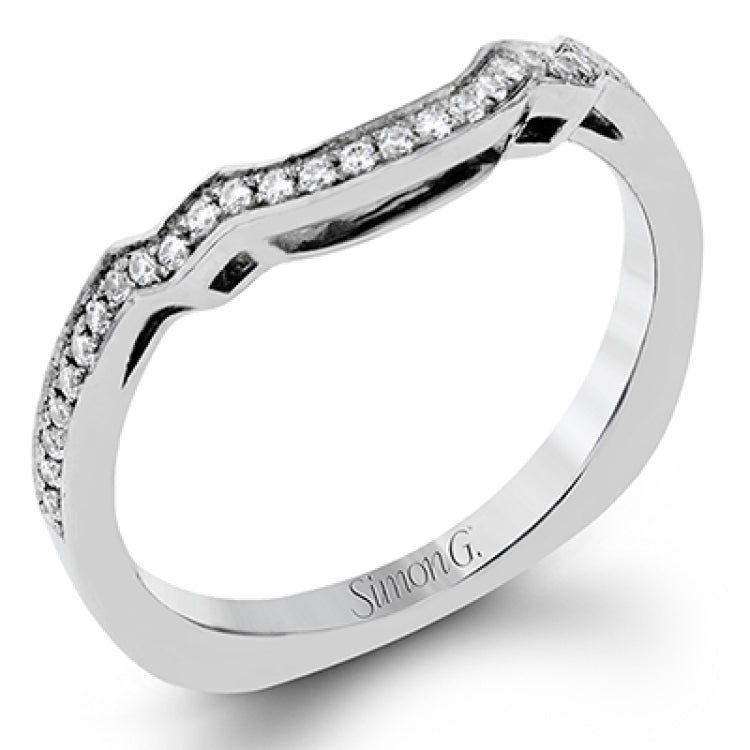 This impressive white gold ring features .43 ctw emerald cut side diamonds and is accented with .38 ctw round cut diamonds.