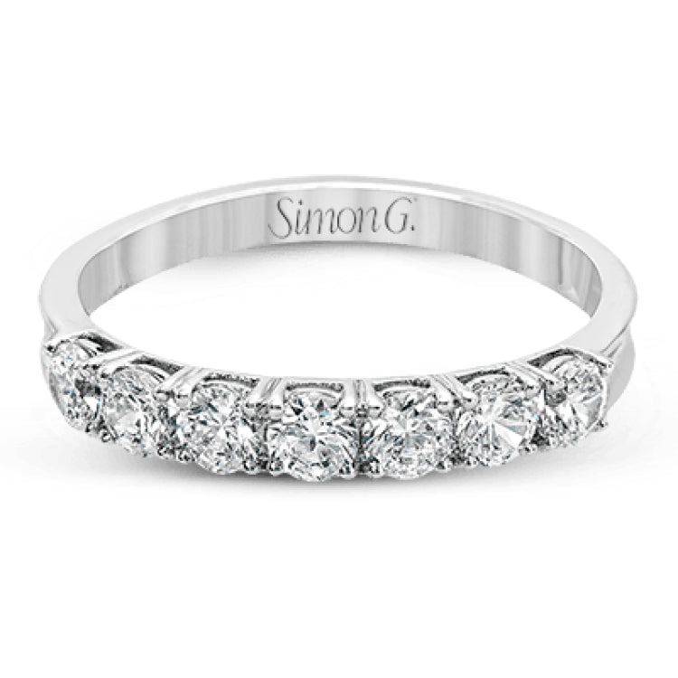 Elegant in its simplicity, this brilliant classically-styled platinum band is set with .75 ctw striking round cut white diamonds.