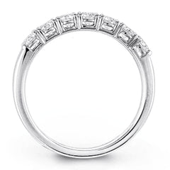 Elegant in its simplicity, this brilliant classically-styled platinum band is set with .75 ctw striking round cut white diamonds.