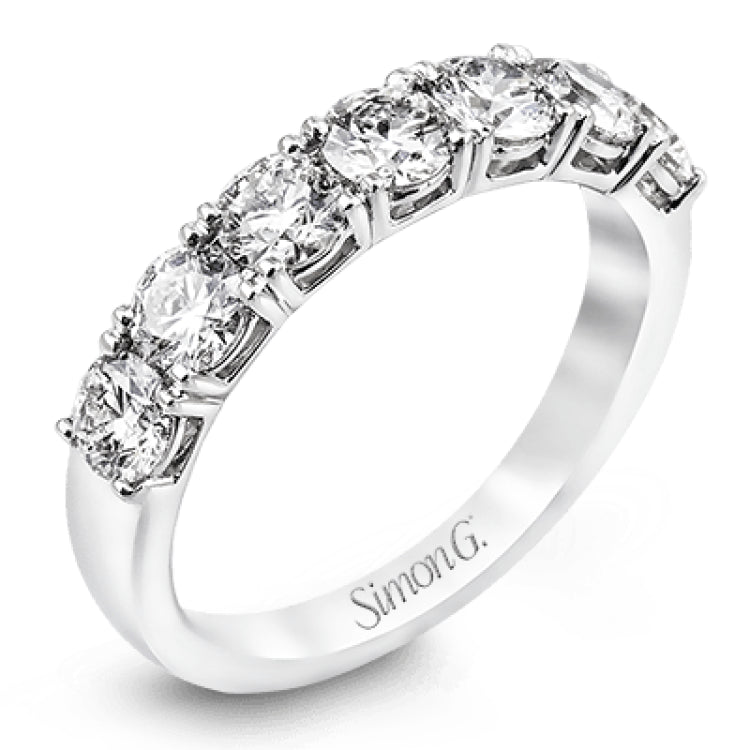 Featuring a dazzling classic design, this platinum band is accentuated by a row of 1.50 ctw sparkling round cut white diamonds.