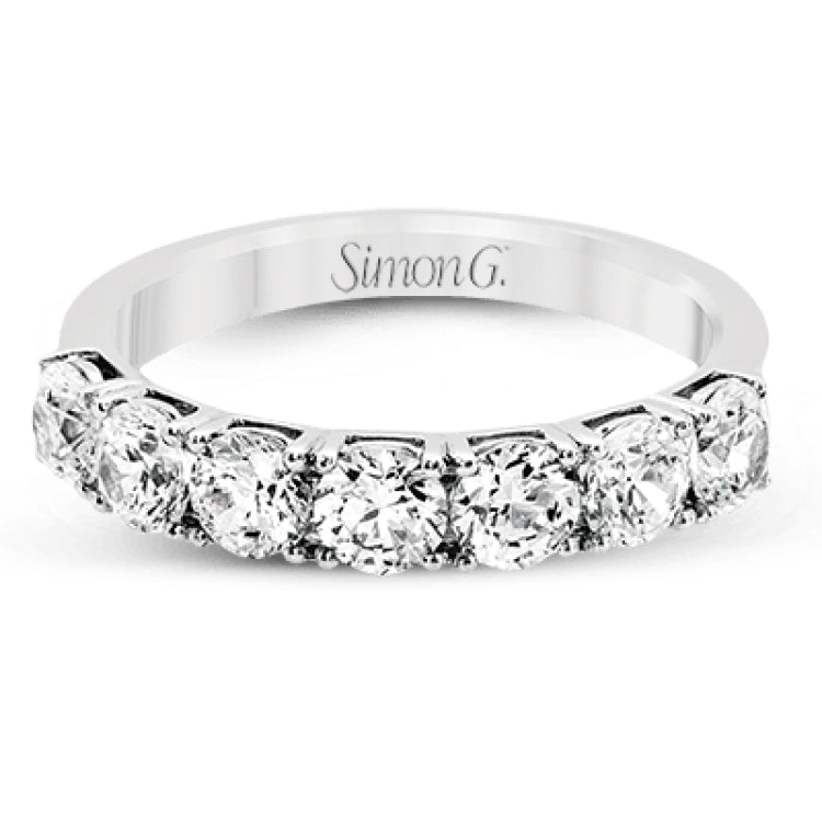 Featuring a dazzling classic design, this platinum band is accentuated by a row of 1.50 ctw sparkling round cut white diamonds.