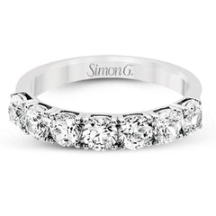 Featuring a dazzling classic design, this platinum band is accentuated by a row of 1.50 ctw sparkling round cut white diamonds.