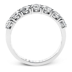 Featuring a dazzling classic design, this platinum band is accentuated by a row of 1.50 ctw sparkling round cut white diamonds.