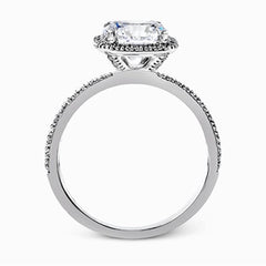 Featuring a contemporary take on a vintage style, this white gold engagement ring and band is complemented by .50 ctw of striking round cut white diamonds.