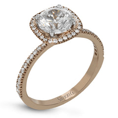 Featuring a contemporary take on a vintage style, this white gold engagement ring and band is complemented by .50 ctw of striking round cut white diamonds.