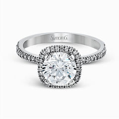Featuring a contemporary take on a vintage style, this white gold engagement ring and band is complemented by .50 ctw of striking round cut white diamonds.