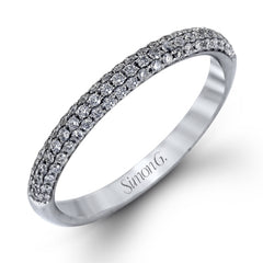 The classic design of this white gold engagement ring and wedding band set is emphasized by .72 ctw round cut white diamonds.