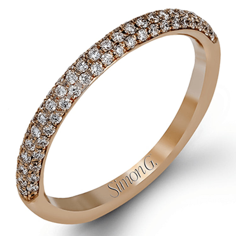 The classic design of this white gold engagement ring and wedding band set is emphasized by .72 ctw round cut white diamonds.