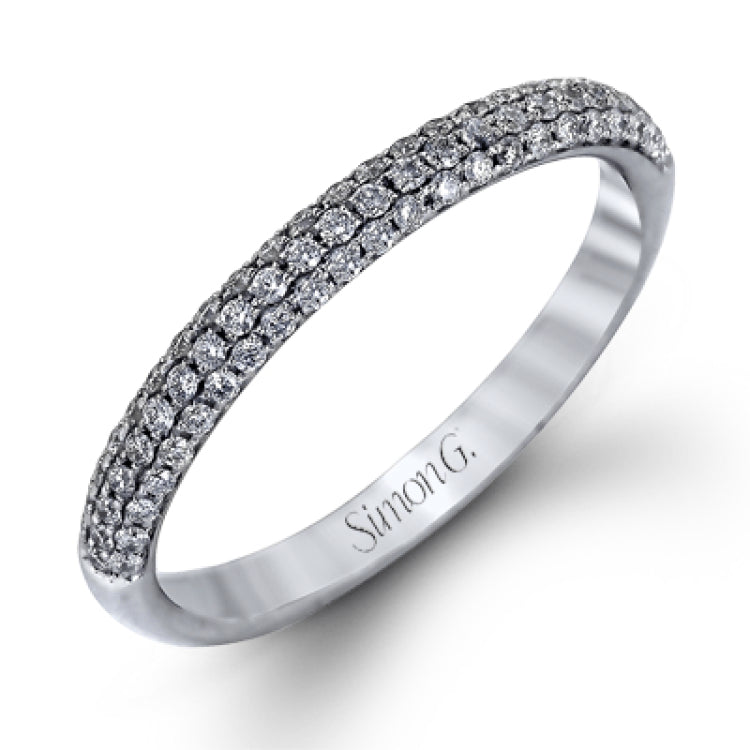 The classic design of this white gold engagement ring and wedding band set is emphasized by .72 ctw round cut white diamonds.