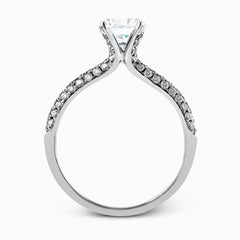 The classic design of this white gold engagement ring and wedding band set is emphasized by .72 ctw round cut white diamonds.