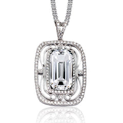 Make others green with envy by wearing this 18k white gold pendent featuring 5.67ct green tourmaline surrounded by .62cttw diamonds.