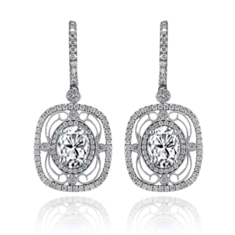 Featuring delicate vintage-inspired styling, these beautiful earrings are set with 1.00 ctw of round cut white diamonds and 2.21 ctw of lovely aquamarines.