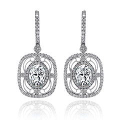 Featuring delicate vintage-inspired styling, these beautiful earrings are set with 1.00 ctw of round cut white diamonds and 2.21 ctw of lovely aquamarines.