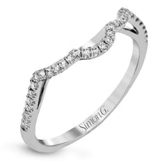 Set with .35 ctw of arresting round cut white diamonds, this lovely white gold engagement ring features a memorable intertwined design on the band.