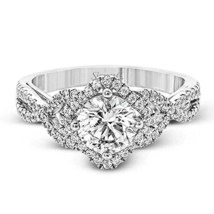 Set with .35 ctw of arresting round cut white diamonds, this lovely white gold engagement ring features a memorable intertwined design on the band.