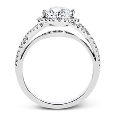 Set with .35 ctw of arresting round cut white diamonds, this lovely white gold engagement ring features a memorable intertwined design on the band.
